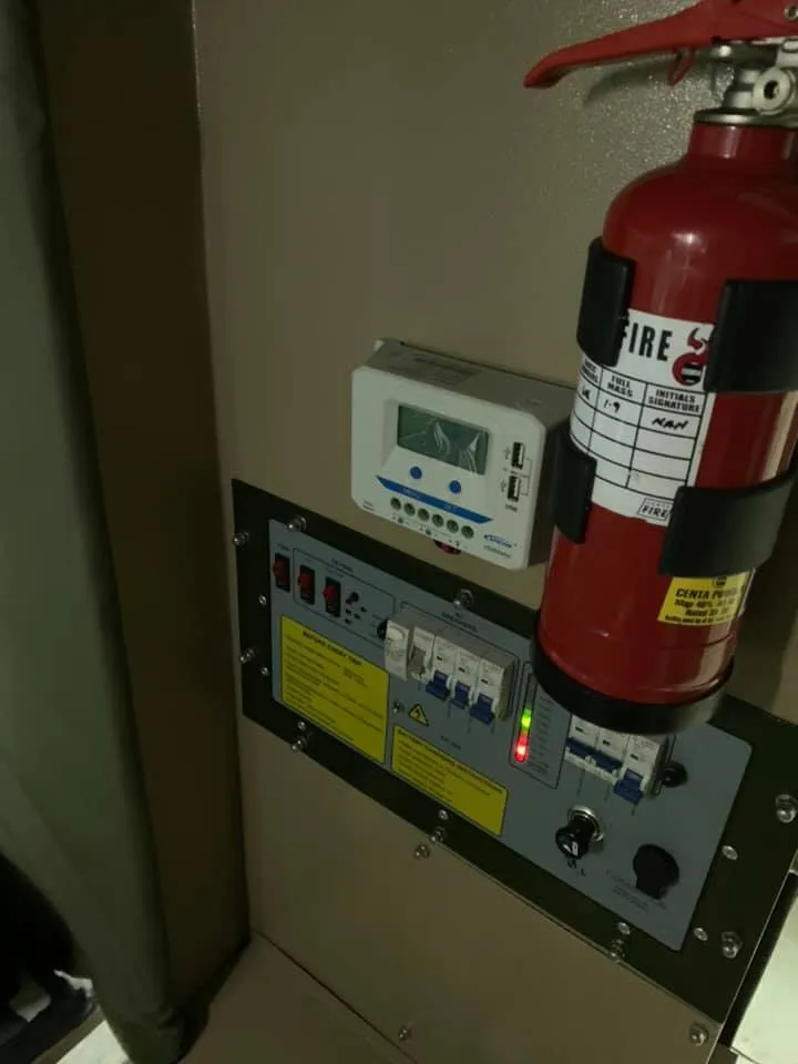 12V dual battery system control panel with solar charger monitor, breakers and fire extinguisher